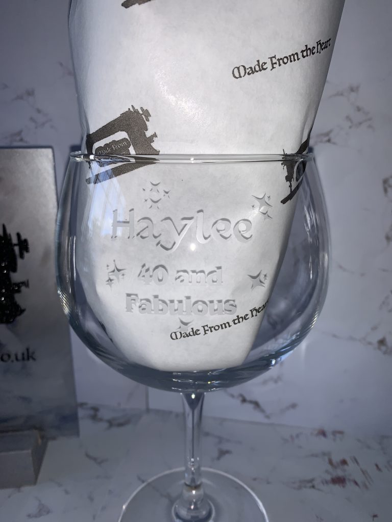 Etched ginball glass customised to suit your needs. This one features the words 40 and Fabulous and the name Haylee