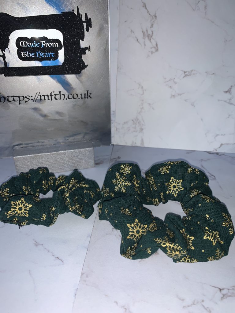Green and gold snowflake Christmas scrunchies. Available in small and medium sizing