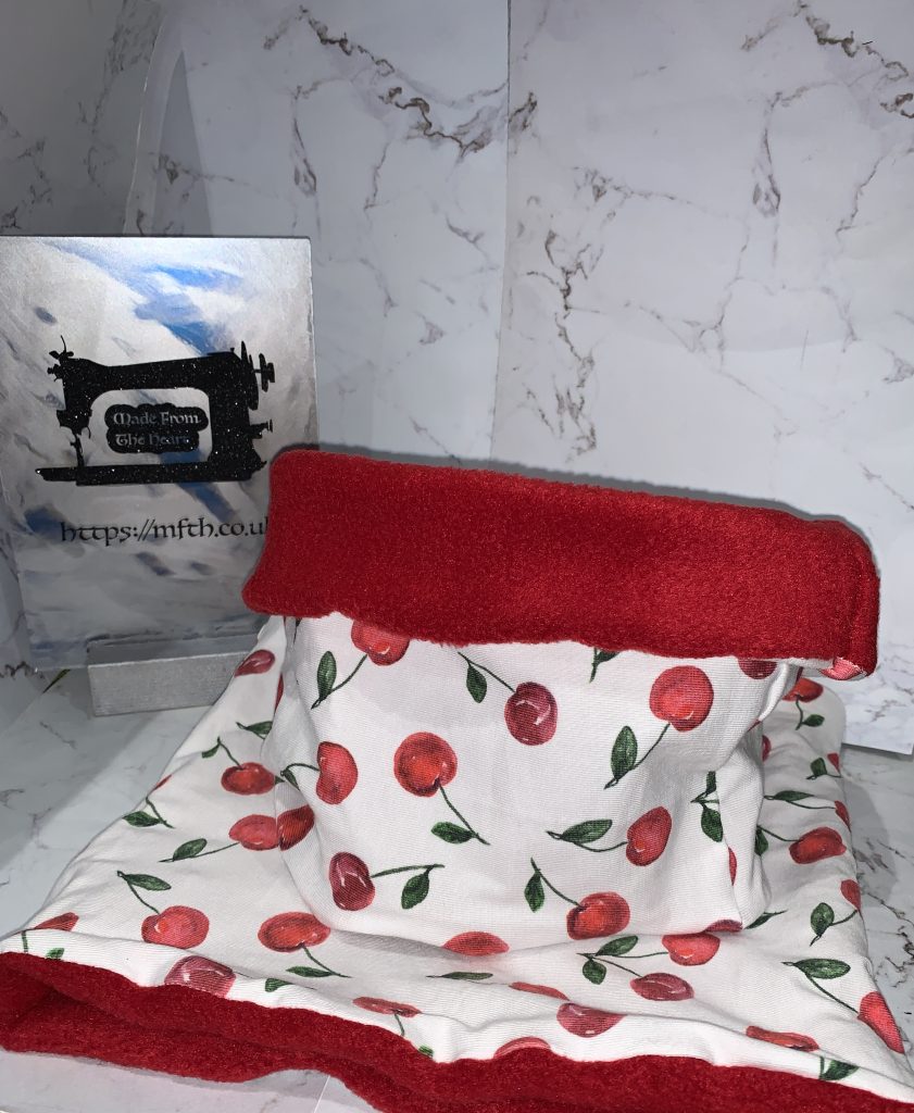 Red Fleece with white jersey featuring red cherries