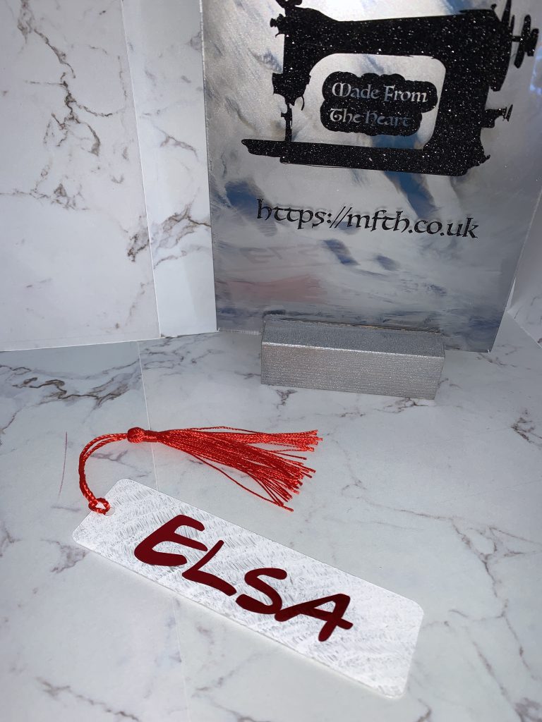 Friends inspired bookmark, custom painted with a quote on the reverse. Finished in metallic red with a red tassel and white paint work