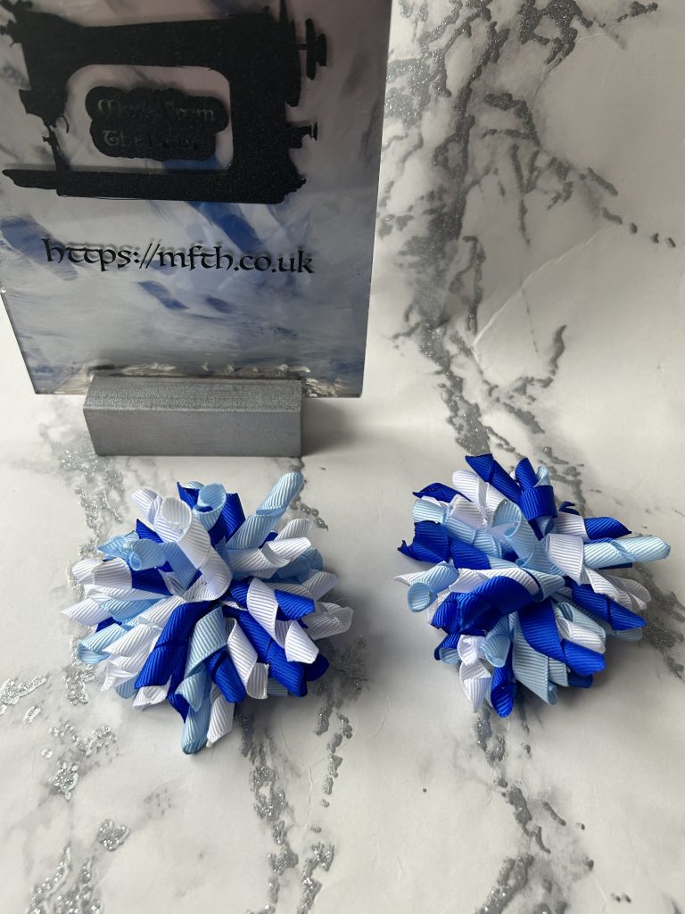 Sky blue, white and Royal blue korker school bows on clasps