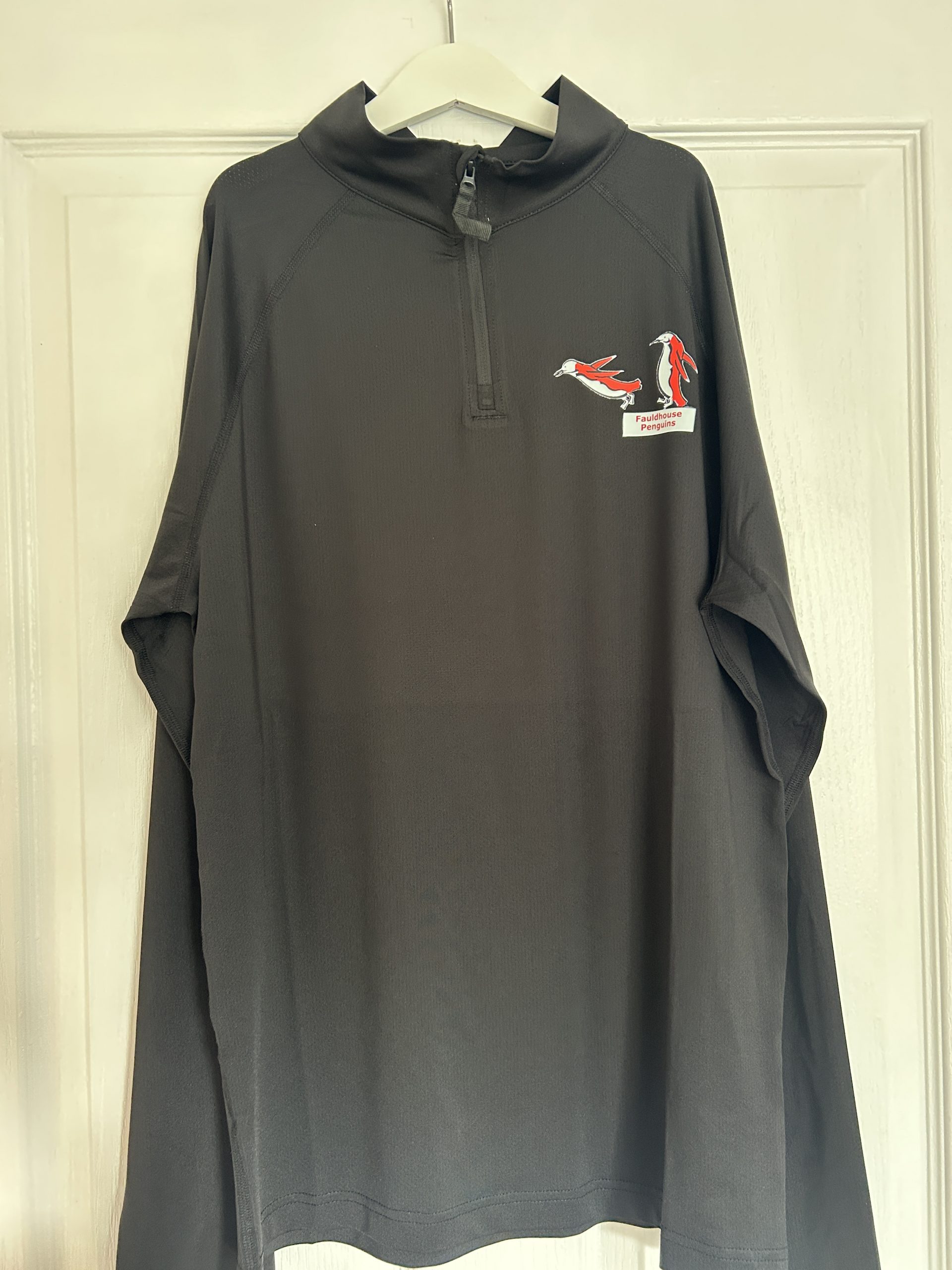 Black 1/4 zip penguins white dive board logo on right breast